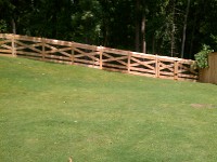 Cross Buck Fencing Adjacent to Cedar Cap & Trim